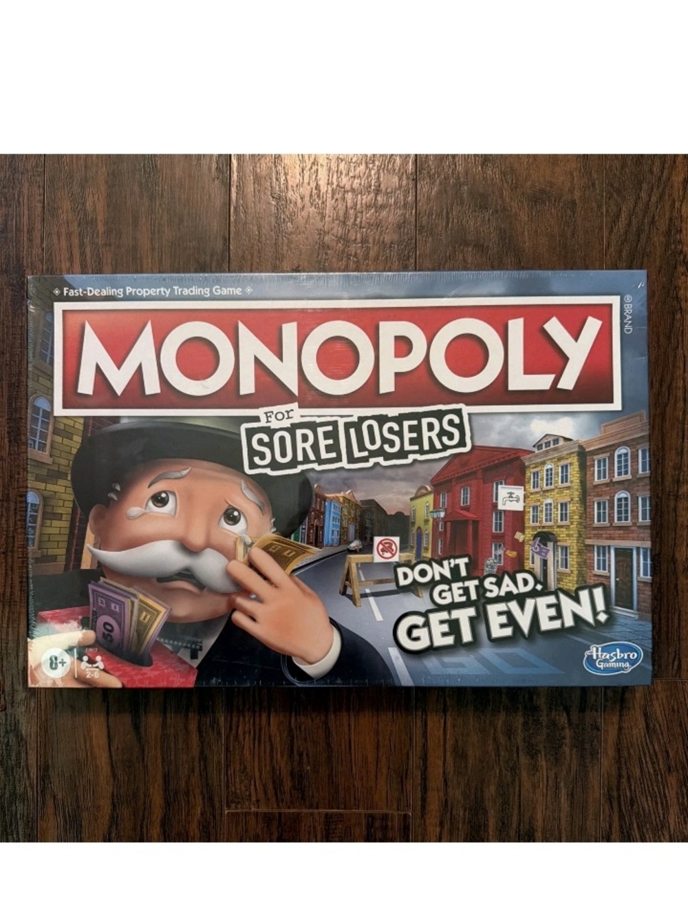 Hasbro Monopoly For Sore Losers Board Game - Red and Blue Box Artwork